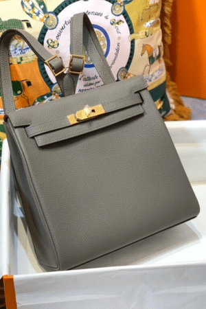 [에르메스] 켈리 Ado Backpack 22cm Togo/ Gris Meyer - Gold