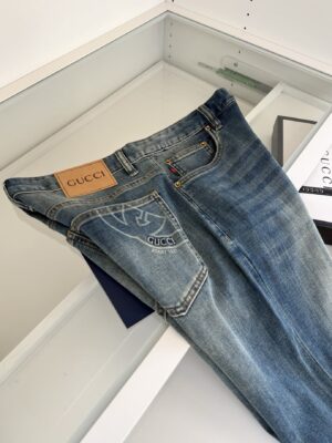 [구찌] 크레스트 자수 데님 진