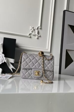 [샤넬] 쁘띠삭 플랩백 골드볼 그레이 골드