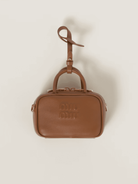 [미우미우] 가죽 마이크로 주머니 5NR020_2F8W_F0046