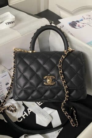 [샤넬] 코코 핸들 미니 블랙/화이트 캐비어 카프스킨 체인탑 금장 AS2215