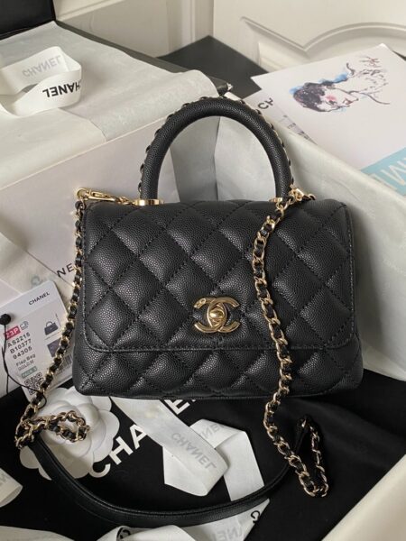 [샤넬] 코코 핸들 미니 블랙/화이트 캐비어 카프스킨 체인탑 금장 AS2215